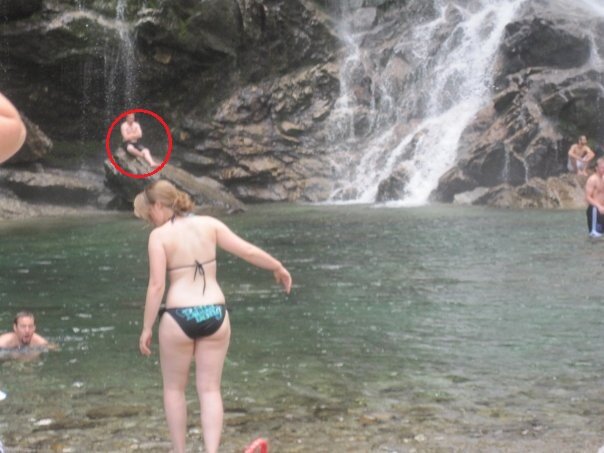 My friend breathing deeply under a glacier waterfall. Intense cold shower therapy!
